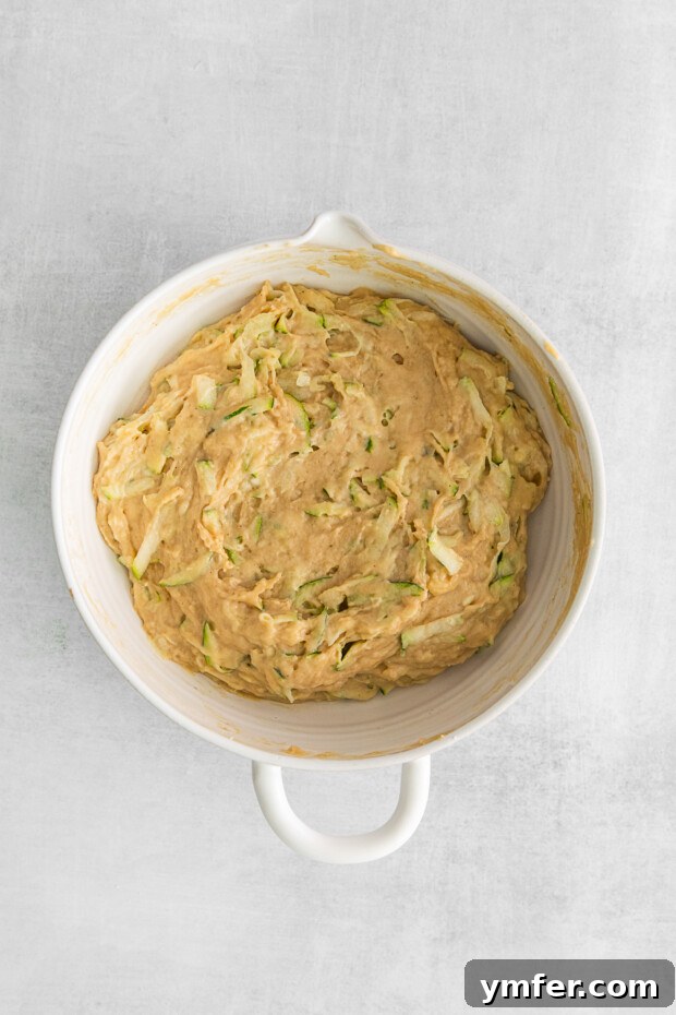 Zucchini Bread batter in a bowl. 