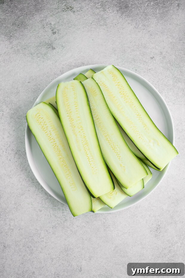 Fire-Kissed Zucchini 4 Thinly sliced zucchini, perfectly prepared for grilling.