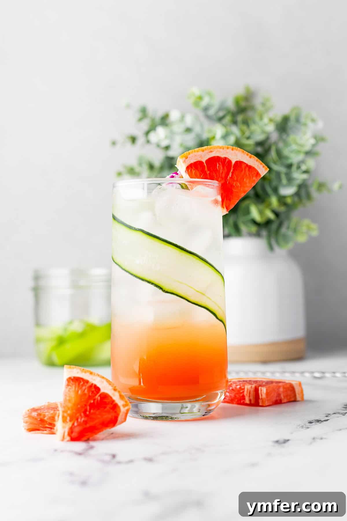 Grapefruit Gin Sparkler 9 Another view of a Grapefruit Gin Fizz in a tall cocktail glass, emphasizing its inviting appearance.
