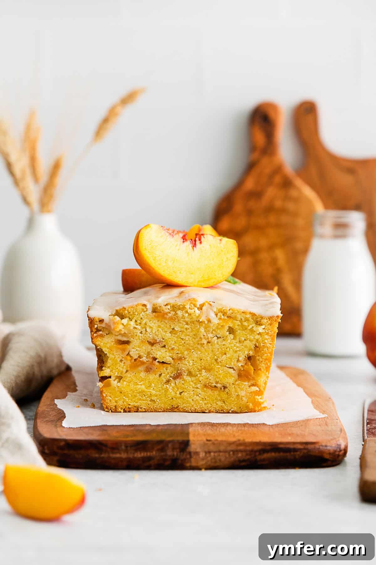 Sun-Kissed Peach Pound Cake 7 Peach Pound Cake sliced to show the inside of the pound cake.