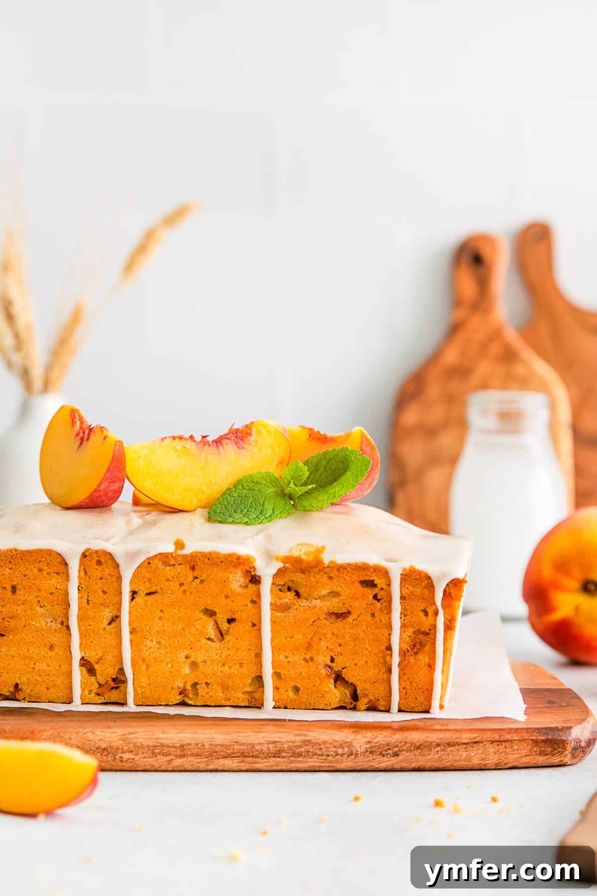 Sun-Kissed Peach Pound Cake 8 Peach Pound Cake on a cutting board.