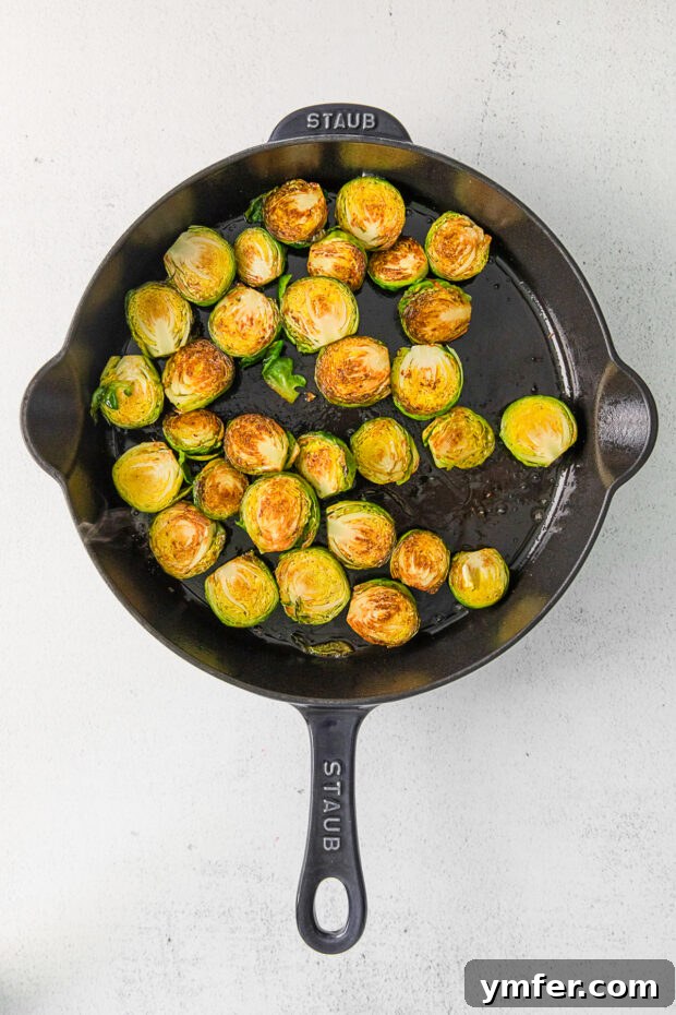 Kung Pao'd Brussels Sprouts 4 Crispy Brussels sprouts in a cast iron skillet.