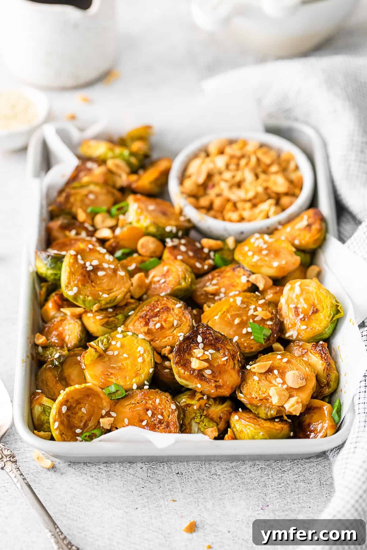 Kung Pao'd Brussels Sprouts 6 Kung Pao Brussels Sprouts topped with sesame seeds.