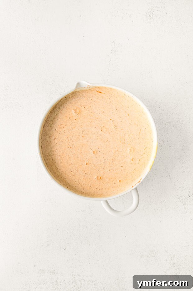 Spiced Pumpkin Creme Brulee 7 Finished pumpkin creme brulee batter, smooth and ready for ramekins.