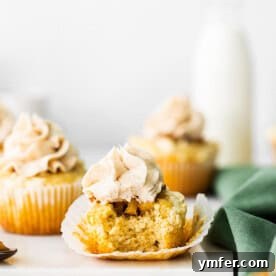 Apple Pie Cupcakes on a cooling rack, ready for filling and frosting.