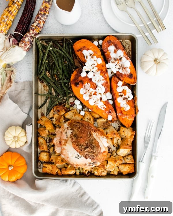 A complete sheet pan Thanksgiving dinner with turkey breast, stuffing, sweet potatoes, and green beans, all cooked on one pan.