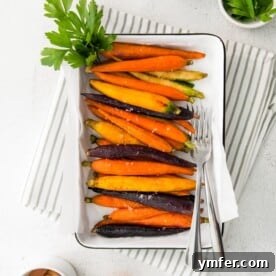 Close-up of honey-glazed roasted carrots.