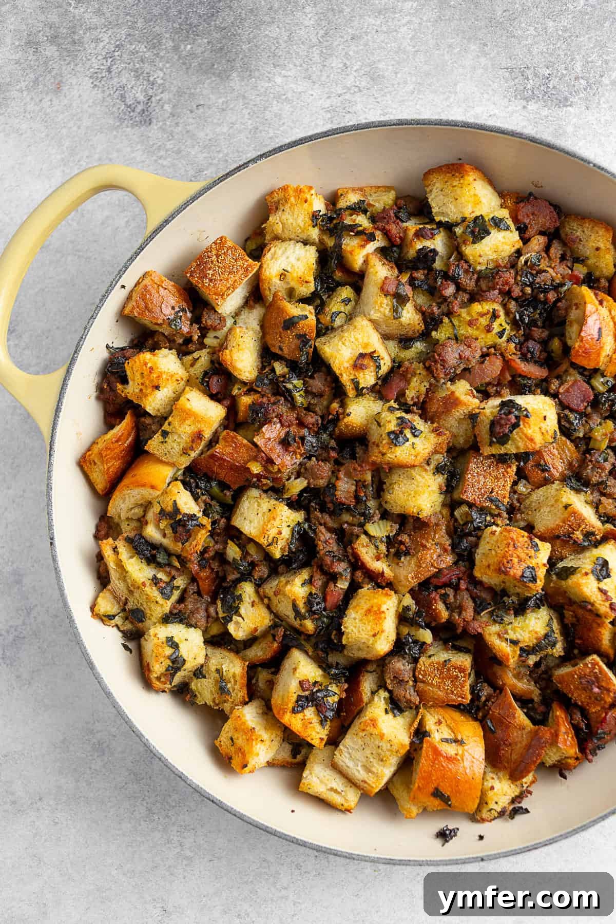 A Feast of Thanksgiving Sides 23 Hearty Sourdough Kale Bacon Sausage Stuffing, a unique and flavorful Thanksgiving side dish.