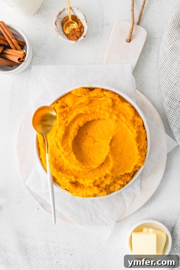 A Feast of Thanksgiving Sides 27 Fluffy and vibrant Instant Pot Mashed Sweet Potatoes served in a bowl, ready for your Thanksgiving table.
