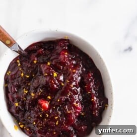 Close-up of a bowl of ginger-laced cranberry orange sauce.