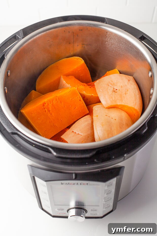 Creamy Instant Pot Butternut Mash 4 Butternut squash halves with seeds removed, ready for cooking.