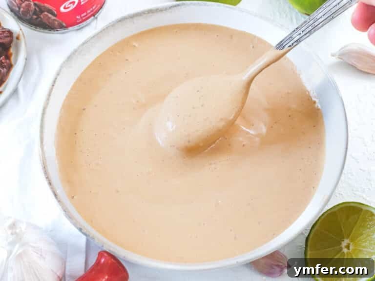 Chipotle sauce in a bowl with a spoon