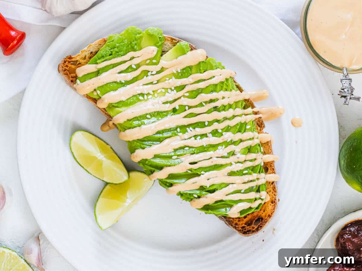 Smoky Chipotle Sauce 9 Chipotle sauce beautifully drizzled over a slice of avocado toast.