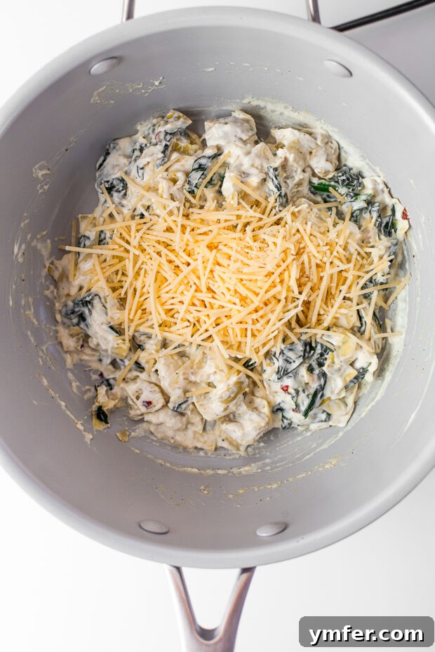 Cheesy Spinach Artichoke Stuffed Mushroom Caps 5 Mushroom filling in a pot.