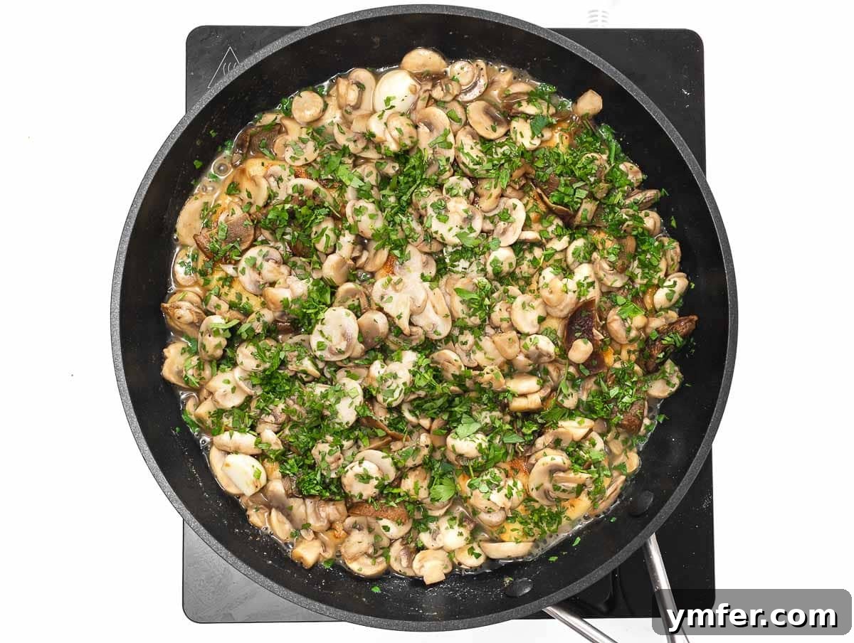 Flavorful Tofu Mushroom Medley 13 Cooked mushrooms, vegetable broth, and parsley added to the pan with tofu.