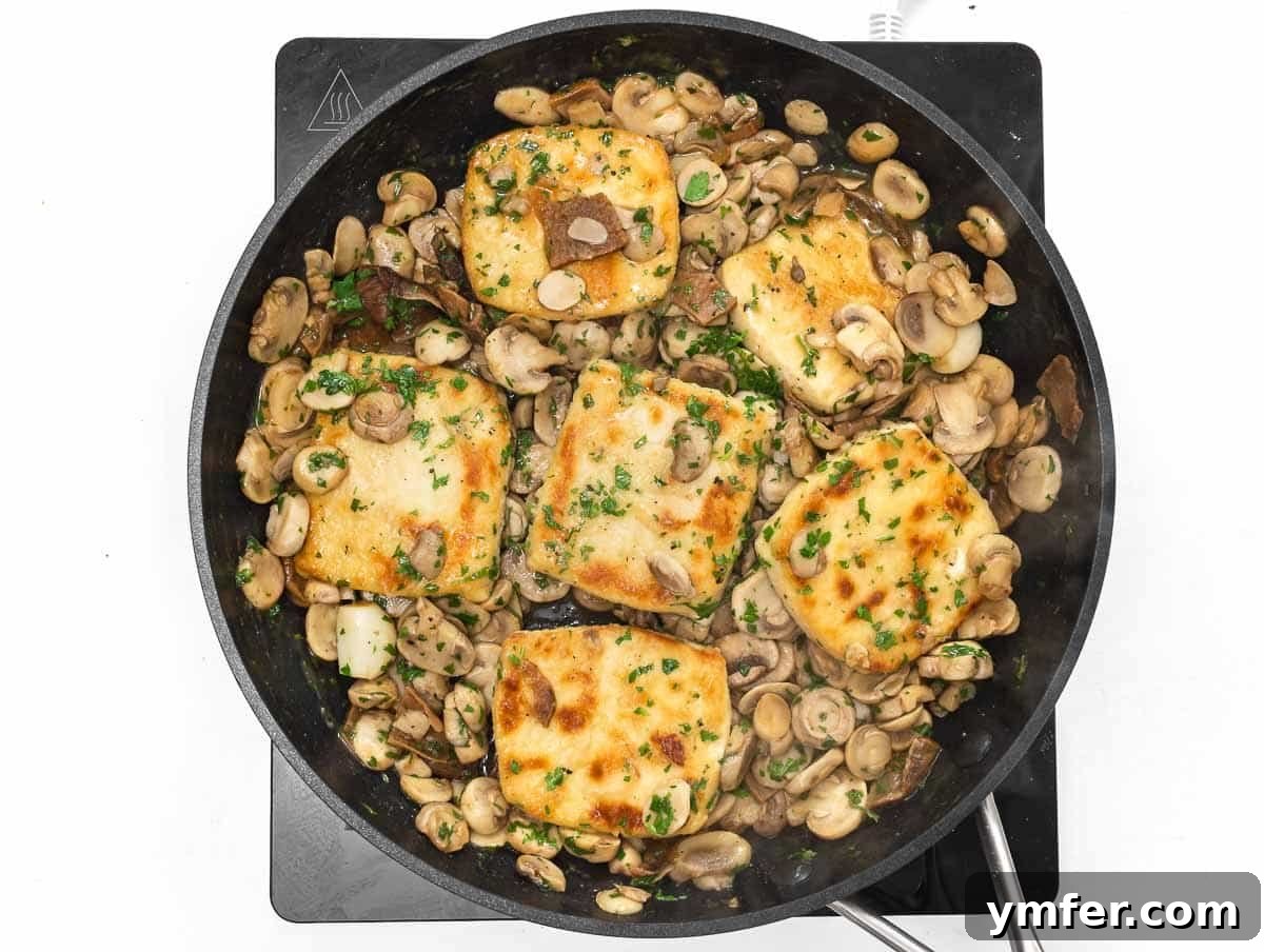 Flavorful Tofu Mushroom Medley 14 The finished tofu mushroom scaloppine dish in the skillet, ready to be served.
