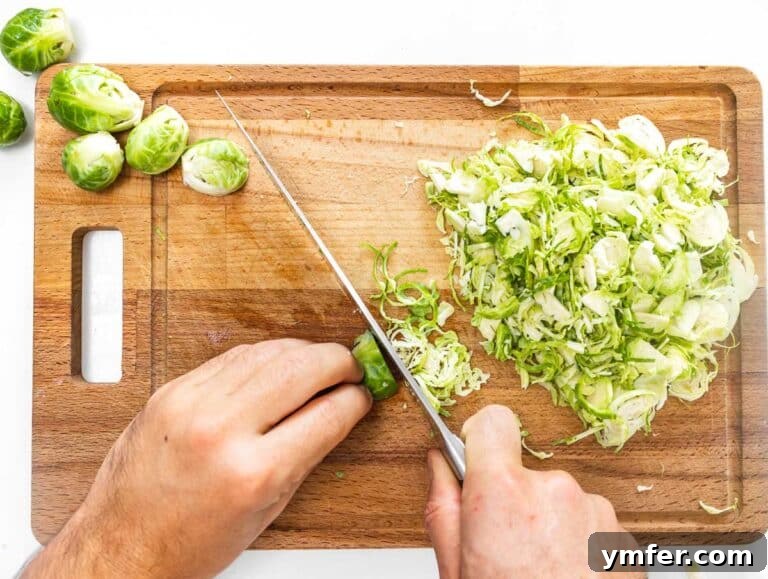 cutting the Brussels sprouts with a knife