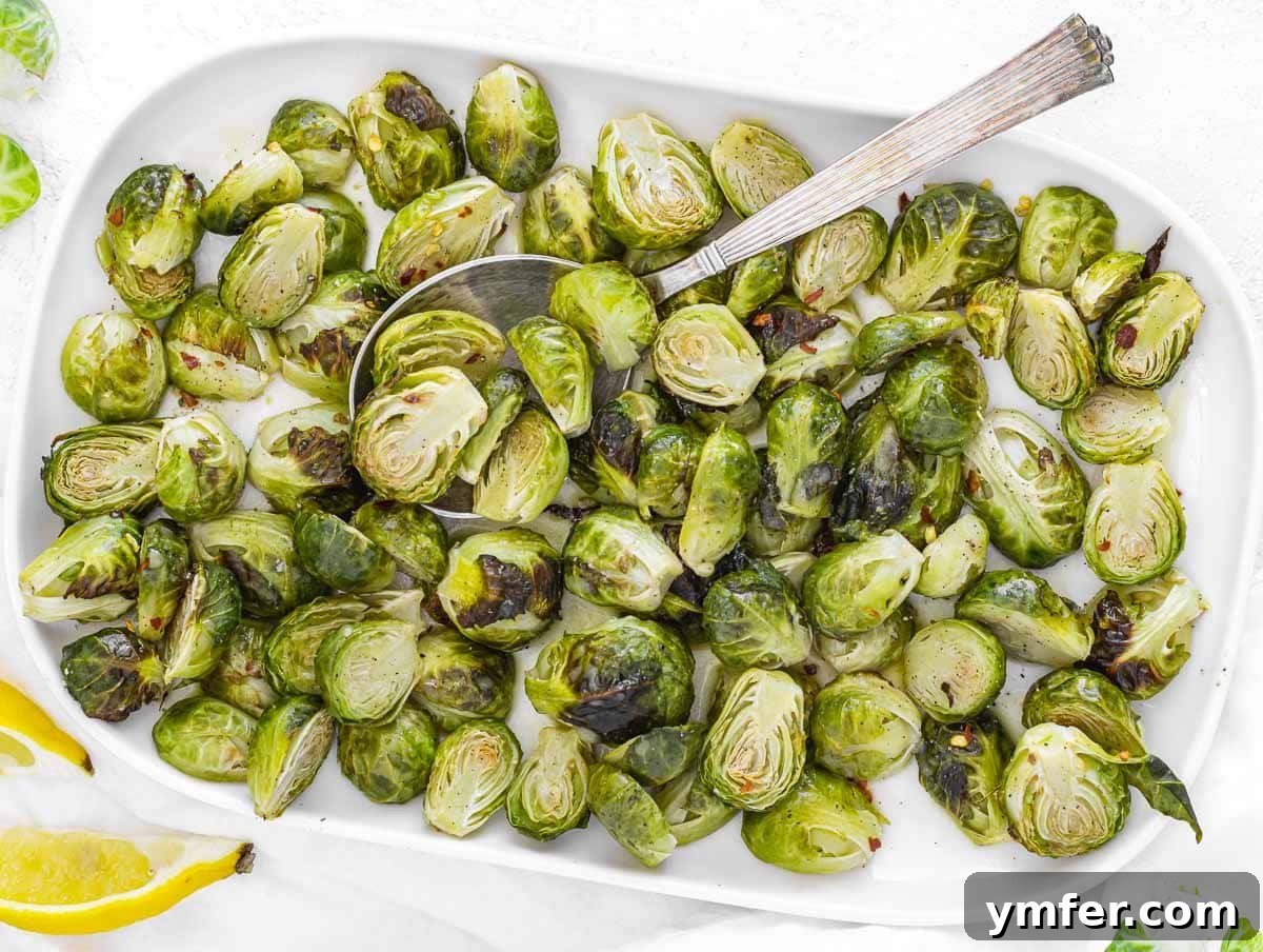 A vibrant platter of roasted brussels sprouts, showcasing their healthy and delicious appeal.