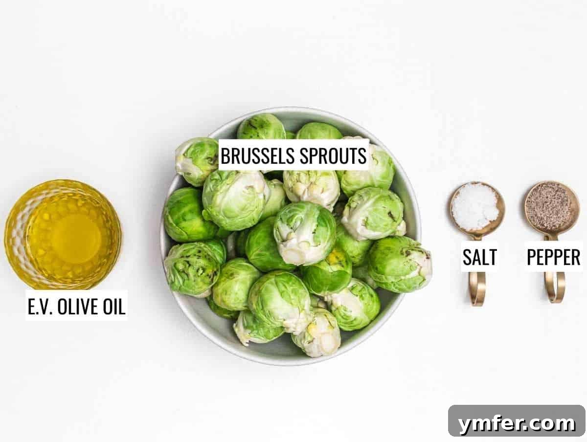 Crispy Roasted Brussels Sprouts 4 Ingredients for roasted Brussels sprouts laid out on a table: Brussels sprouts, olive oil, salt, pepper.