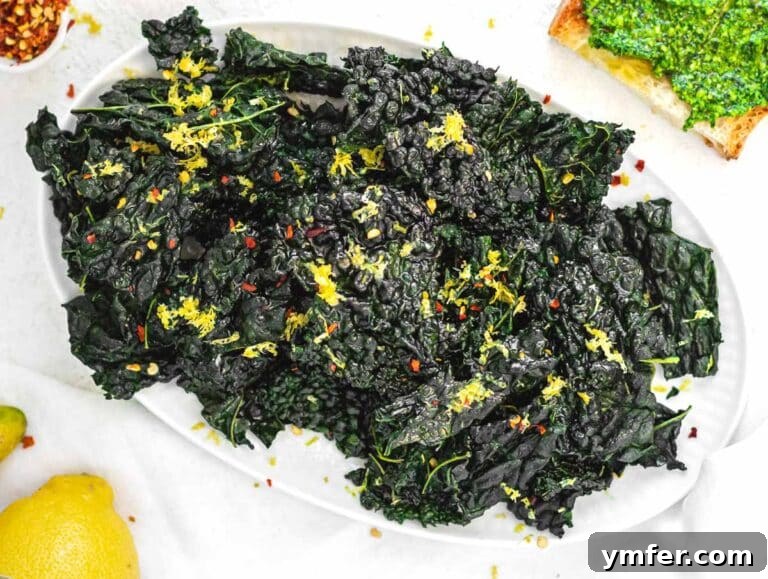 Kale Crunch 18 Kale chips garnished with lemon zest and flakes for serving