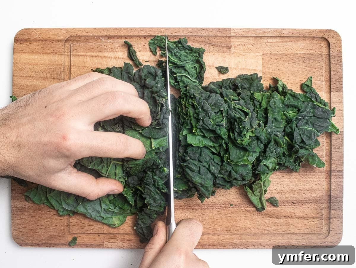 Kale Crunch 7 Chopping fresh kale leaves into manageable pieces