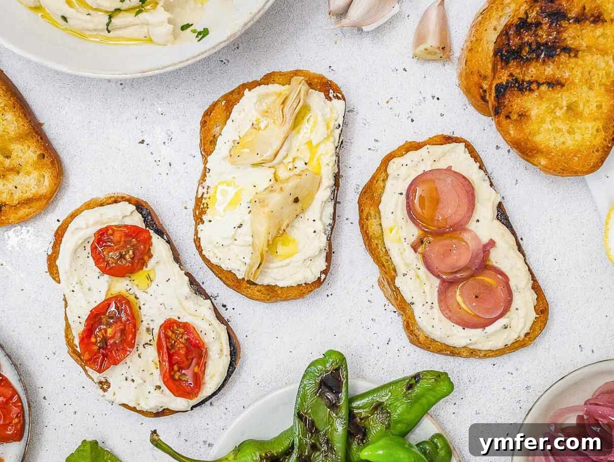 Variety of toasted bread slices with tofu cream cheese and different toppings