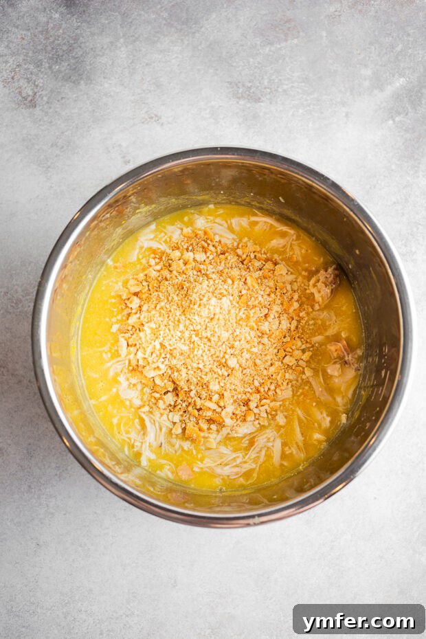 Buckeye State Shredded Chicken Sandwich 6 Shredded chicken in a pot.