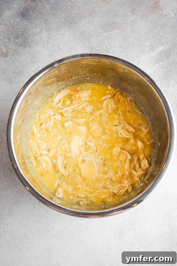 Buckeye State Shredded Chicken Sandwich 7 creamy shredded chicken in a pot.