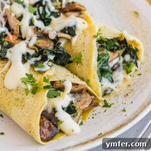 Savory crepes with mushroom and kale filling