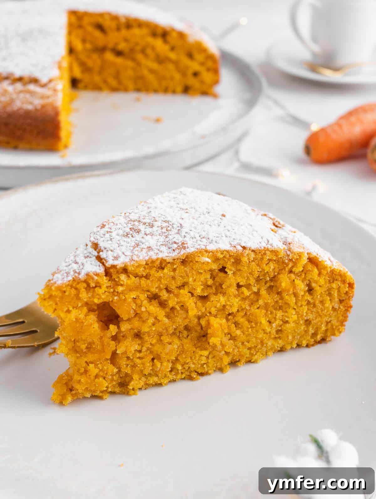 Dolce Carota Cake 2 Close-up of a beautifully baked Italian carrot and orange cake, ready to be sliced.