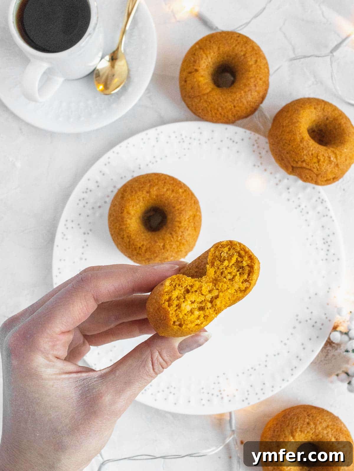 Dolce Carota Cake 20 A stack of delicious baked donuts, showcasing their beautiful texture and glaze.