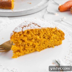 Italian carrot cake, also known as Torta Camilla, with a slice removed.