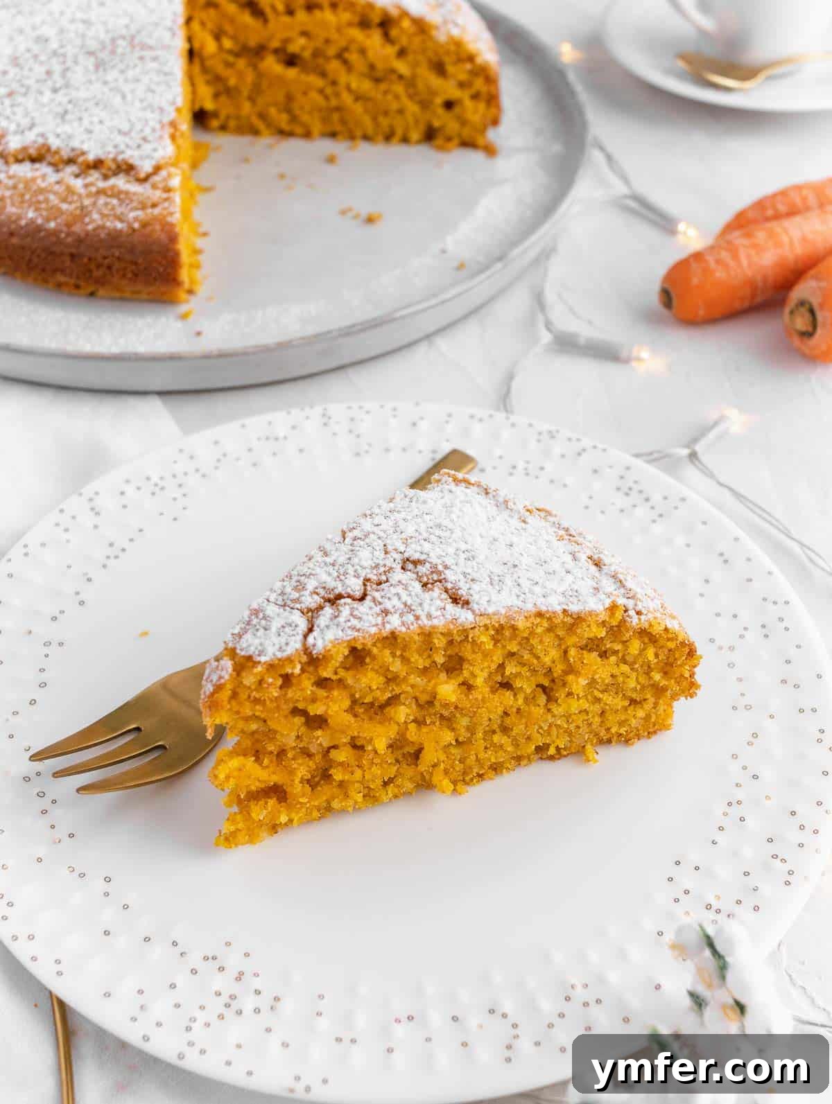 Dolce Carota Cake 5 A perfectly portioned slice of the carrot and orange cake, showcasing its moist interior.