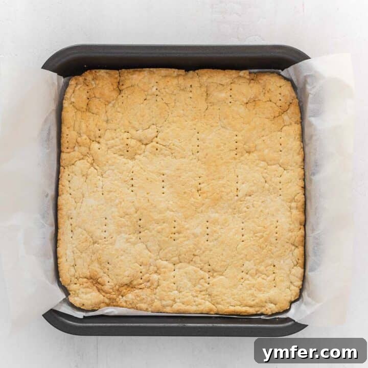 Zesty Plant-Based Lemon Squares 12 The freshly baked and slightly golden vegan pie crust, cooling in the pan.