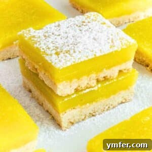 vegan lemon bars with powdered sugar