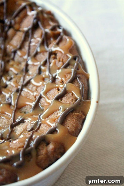 Skillet Baked Chocolate Chip Dream 3 Deep Dish Chocolate Chip Cookie, generously drizzled with melted chocolate