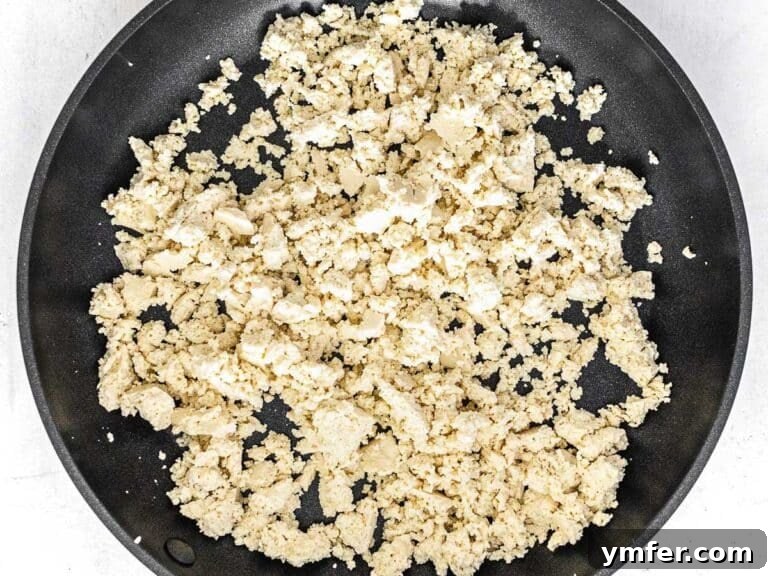 tofu crumbled on a pan