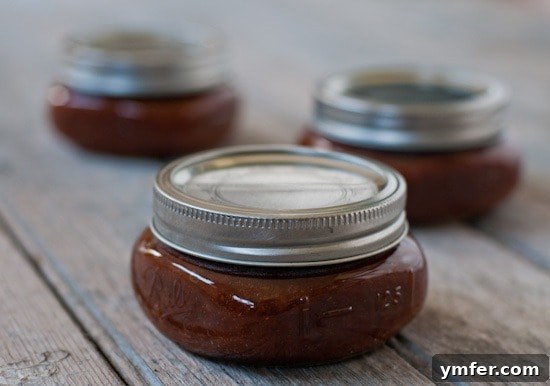 Slow Cooker Homemade Ketchup via Nutmeg Nanny Slow Cooker Homemade Ketchup in a jar.
