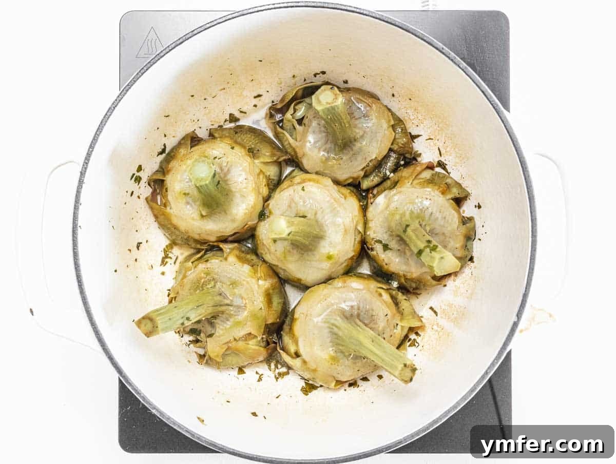 Rome's Signature Artichokes 16 Tender braised artichokes after cooking