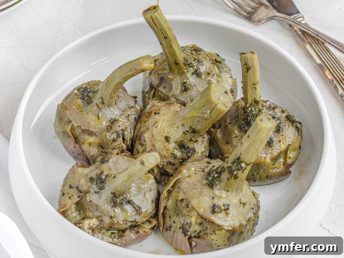 Rome's Signature Artichokes 3 Braised artichokes glistening with olive oil and herbs