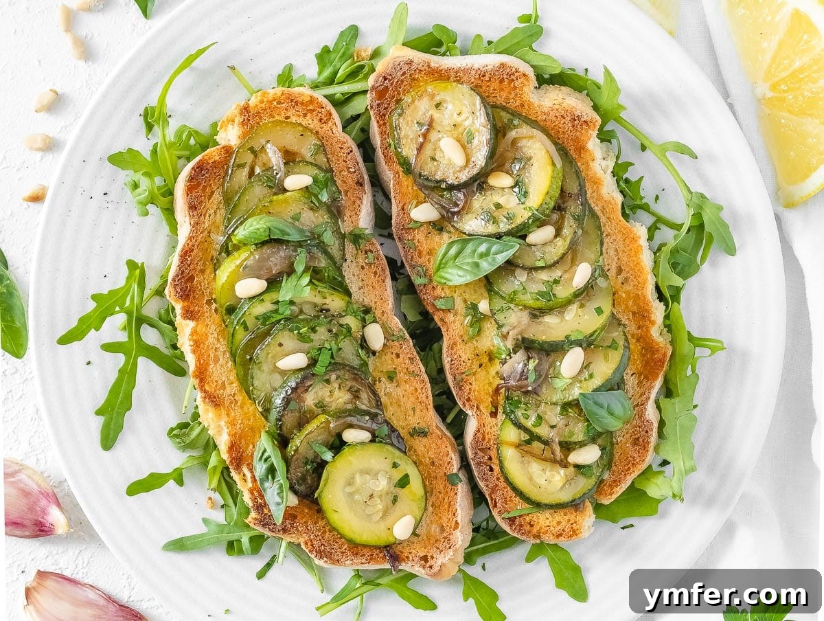 30 Crowd-Pleasing Vegan Starters 11 Crispy bruschetta topped with sautéed zucchini, roasted pine nuts, and fresh basil leaves.