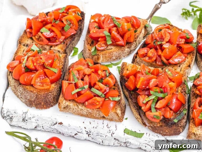 30 Crowd-Pleasing Vegan Starters 30 Bruschetta on a white cutting board