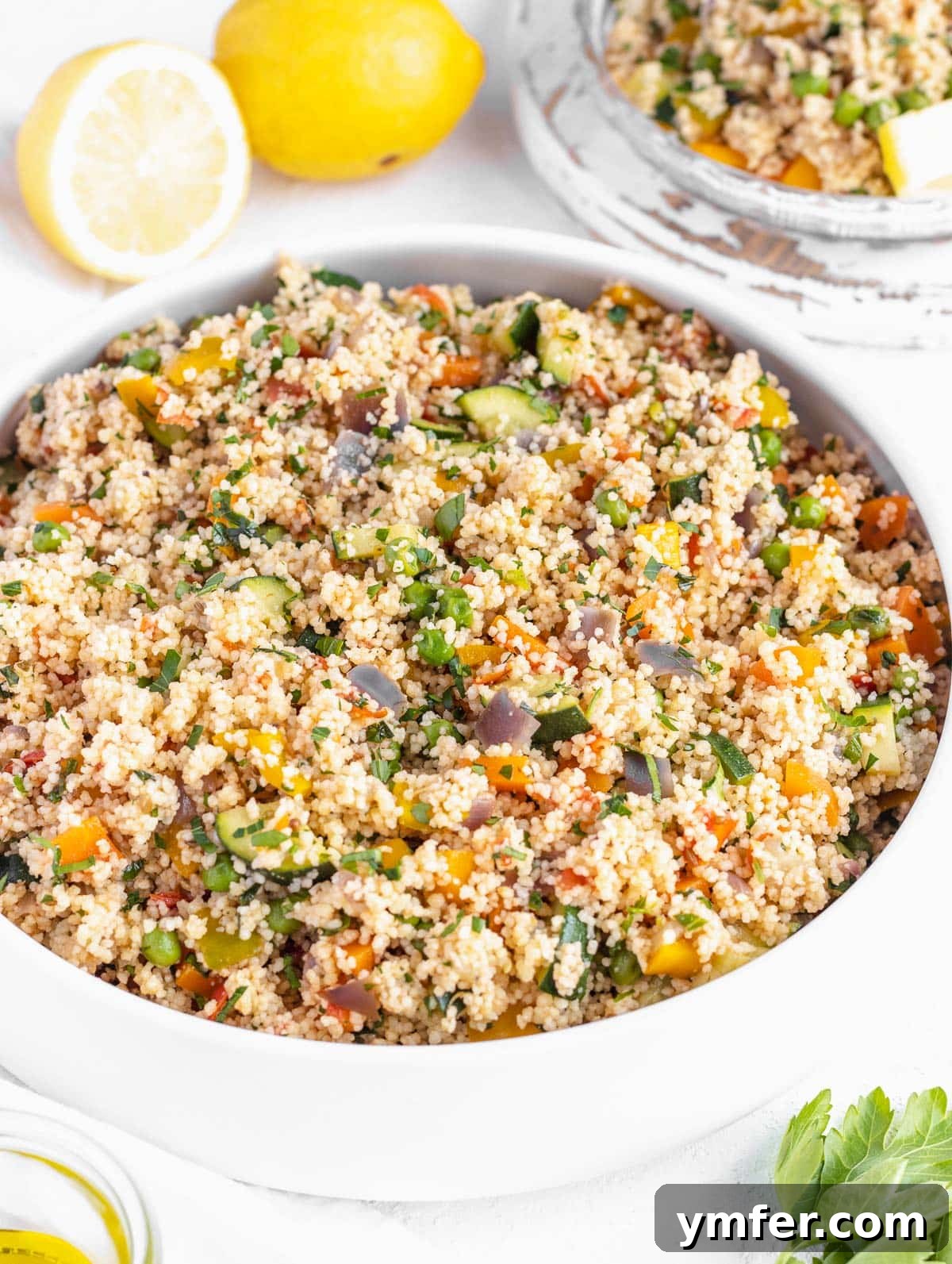 couscous with vegetables in a white bowl