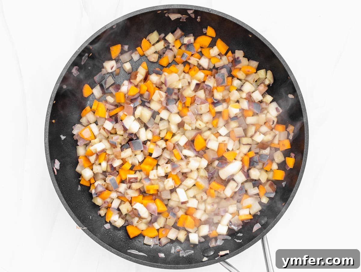 cooked aubergine and carrot on pan