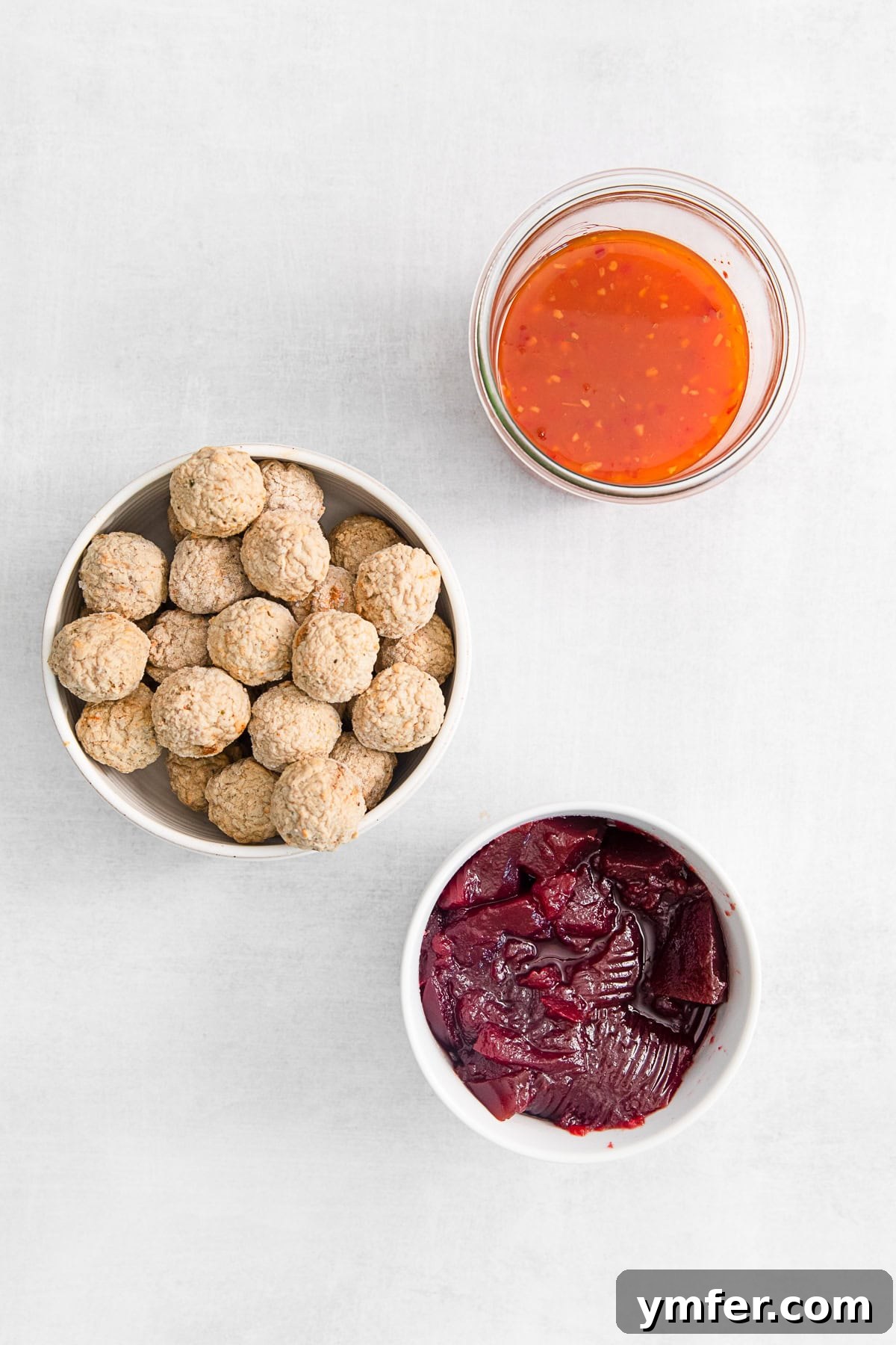 Sweet and Tangy Slow Cooker Cranberry Meatballs 3 Close-up of Slow Cooker Cranberry Meatballs in a bowl, ready to serve
