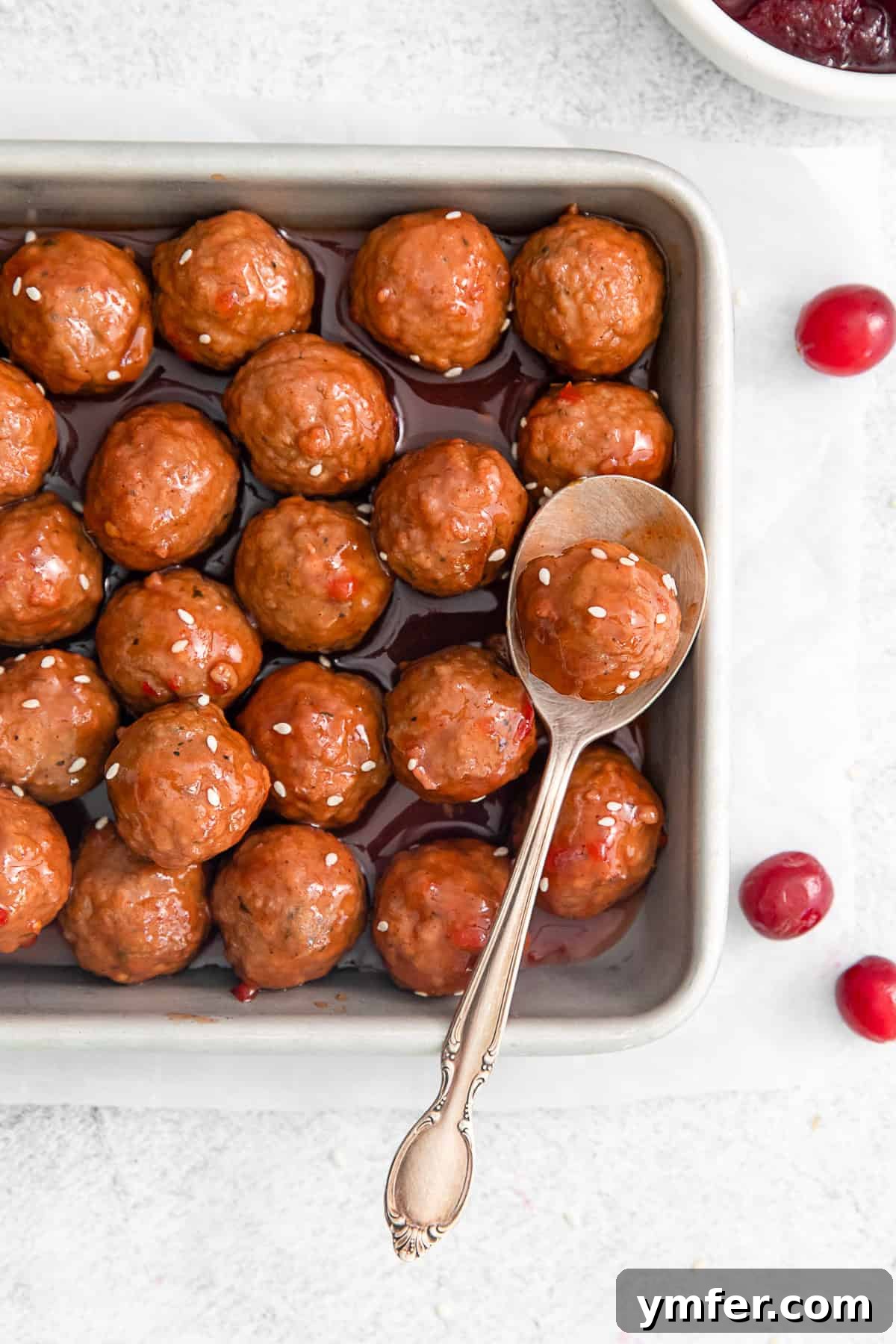 Sweet and Tangy Slow Cooker Cranberry Meatballs 5 Delicious Slow Cooker Cranberry Meatballs in a serving dish