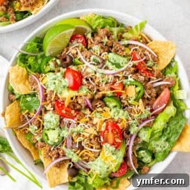 Speedy Taco Salad Delight 6 Taco salad with cilantro lime dressing in a bowl.