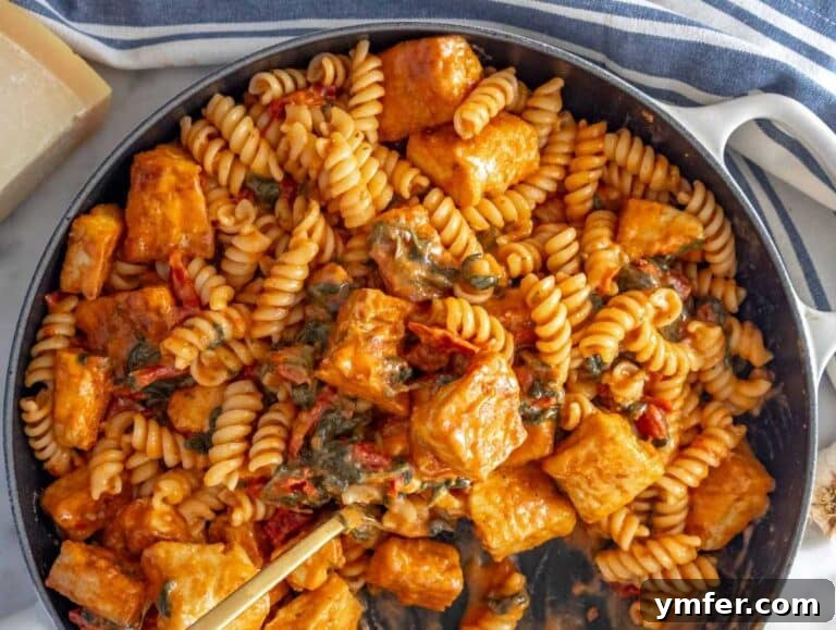 Creamy marry me tofu tofu pasta in a skillet.