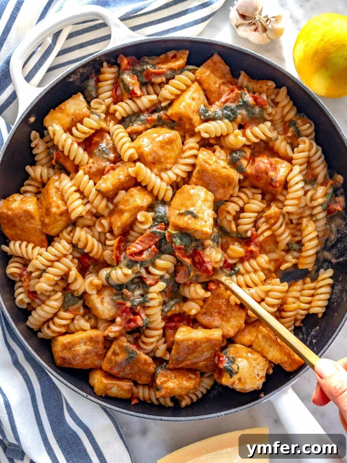 Finished marry me tofu pasta in a creamy sauce, ready to serve.