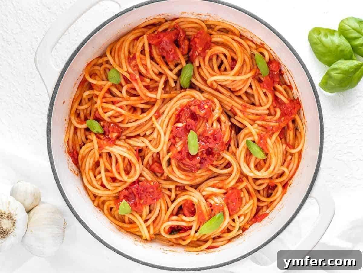 Fiery Rigatoni 15 spaghetti pomodoro in a dutch oven with fresh basil